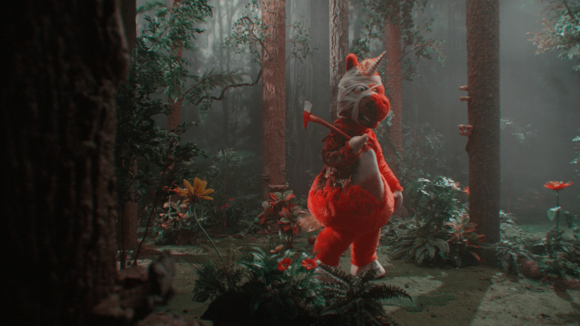 The orange unicorn Buddy in a forest scene from Casper Kelly’s horror film
