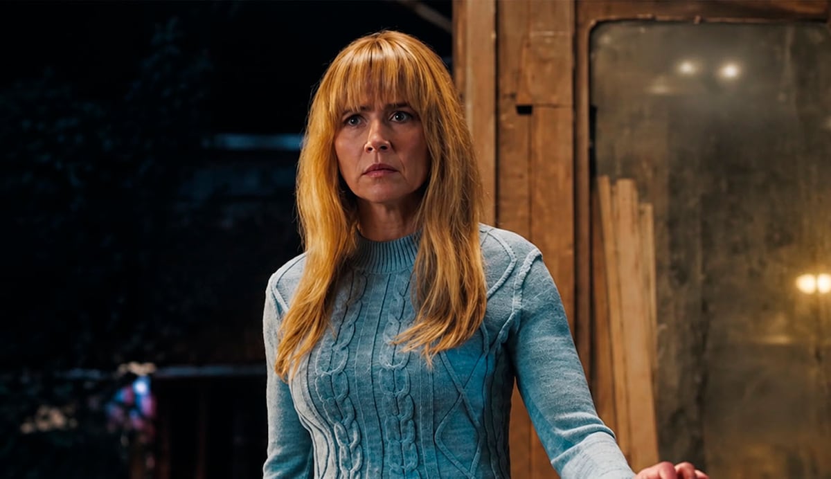 Crystal Lake 2026 preview — Linda Cardellini as Pamela Voorhees wearing a blue sweater