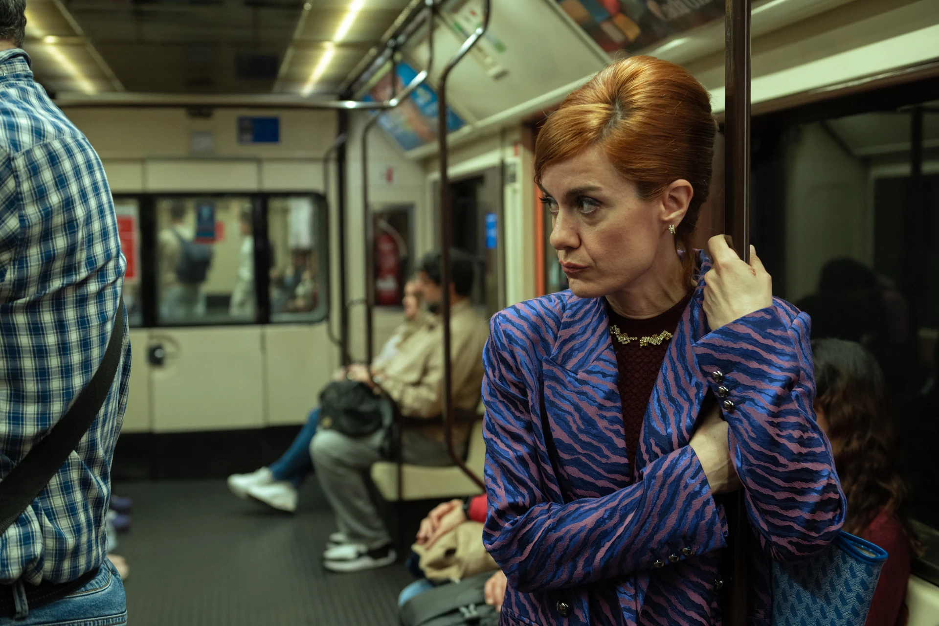 Alexandra Jiménez in a public transport scene from Fading Grandeur