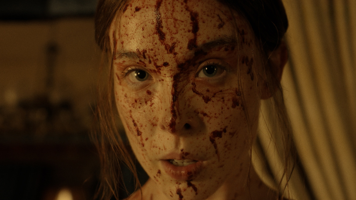 Monster The Lizzie Borden Story 2026 — Ella Beatty in a dramatic blood-spattered scene, Netflix official still