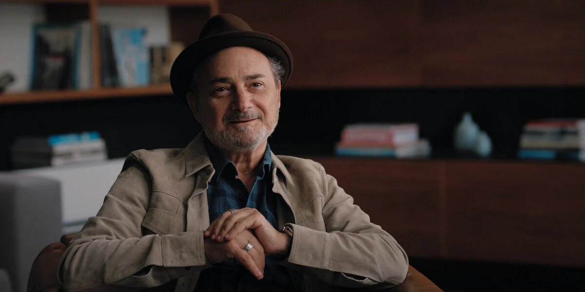 Kevin Pollak in an interview scene from The One About Matthew Perry