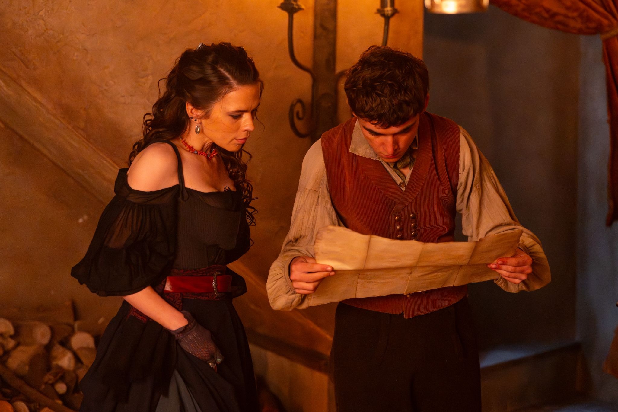 Jim Hawkins and mother Bess study Captain Flint treasure map Treasure Island 2026 Paramount Plus