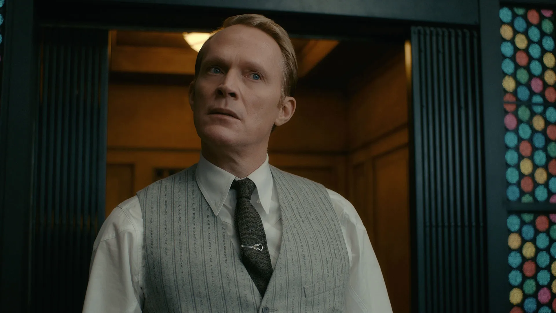 VisionQuest 2026 Paul Bettany as Vision wearing grey pinstripe waistcoat in official Marvel series still